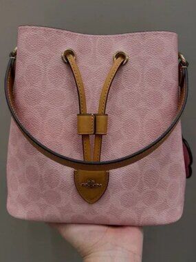 NWT Coach Rowan Bucket Bag Pink In Signature Canvas With Charms CEA23